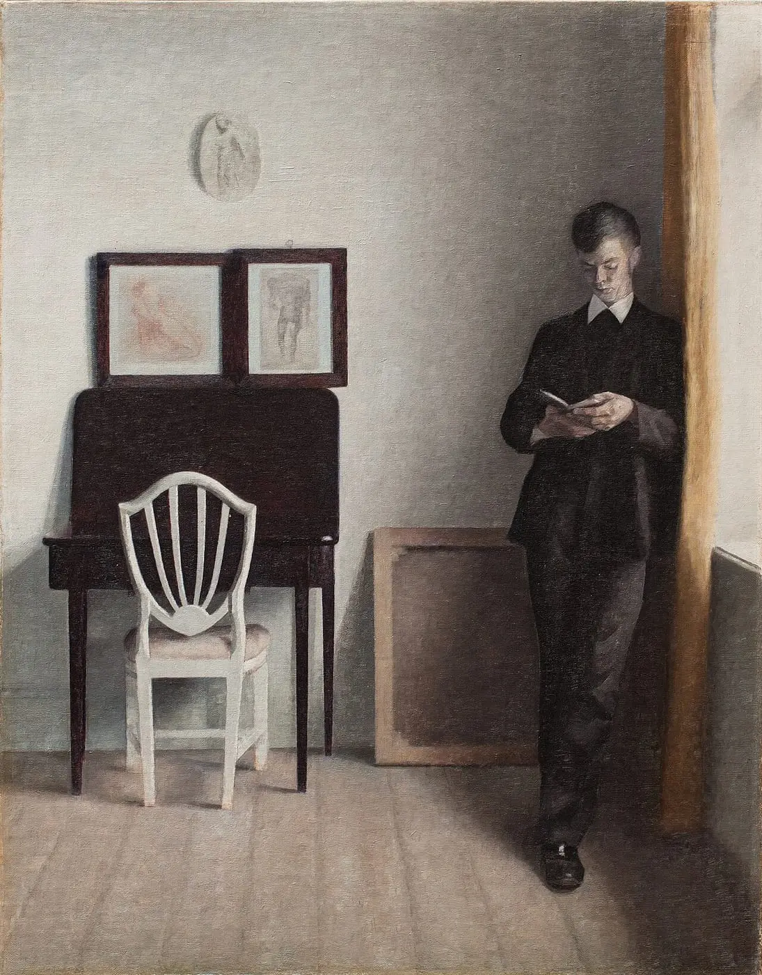 Interior with Young Man Reading by Vilhelm Hammershøi, canvas print